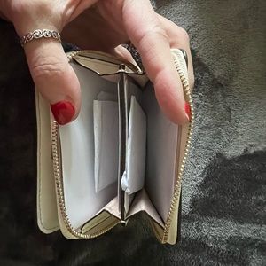 Brand new with tags. Kate Spade purse and wallet
